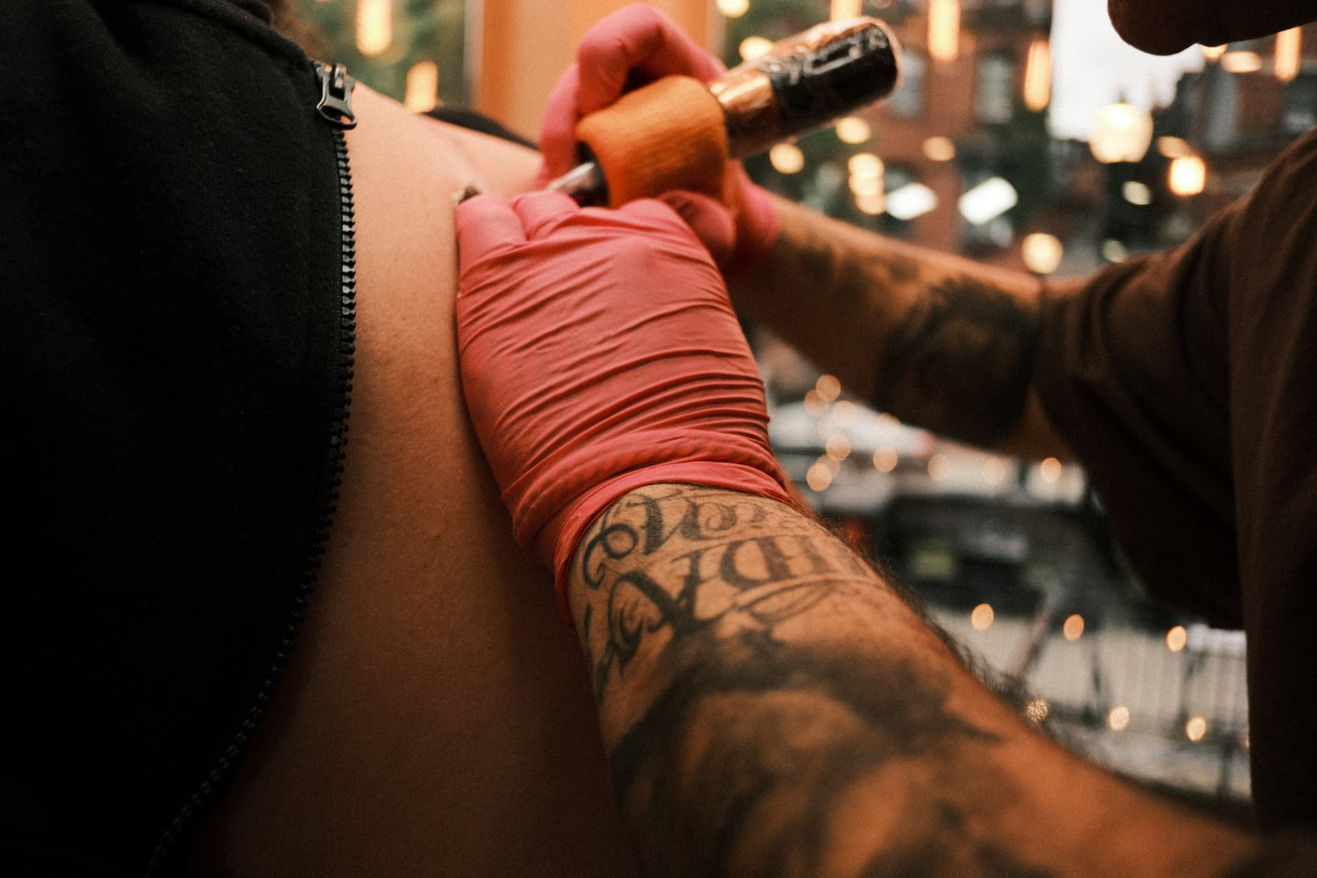 Close view of Abel's tattoo process